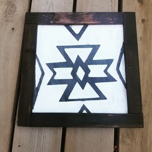 Two wood decor Aztec signs